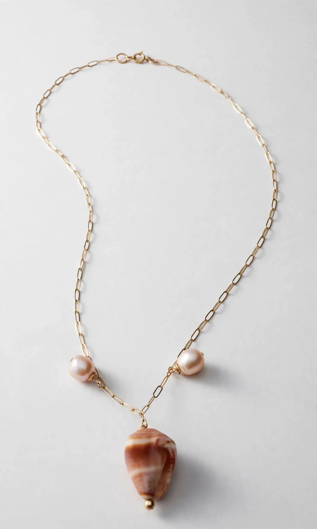 Cone shell and pearl paperclip necklace